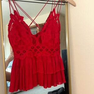 Cute, never worn,There are chest COVERS NOT PADS built into the top